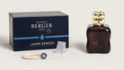 Maison Berger Paris Lampe Berger lamp and packaging on a light background